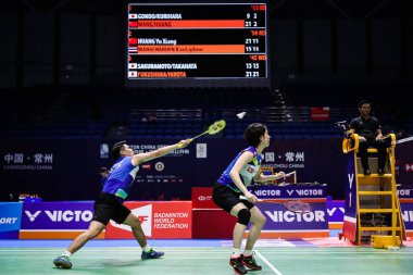 Japanese professional badminton players Kohei Gondo and Ayane Kurihara compete against Chinese professional badminton players Wang Yilv and Huang Dongping at the first round of mixed doubles at VICTOR China Open 2019, in Changzhou city, east China's  clipart