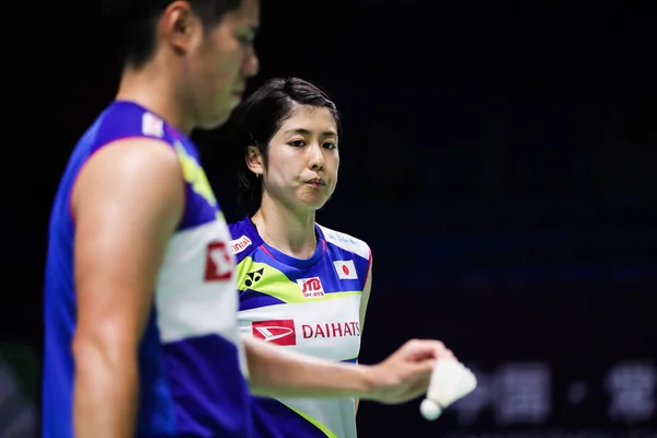 プロバドミントン選手の権藤浩平選手と栗原彩音選手が中国のプロバドミントン選手の王Yilv選手と黄東平選手と中国東部の常州市で開催されたVictor China Open 2019での混合ダブルスの最初のラウンドで競います — ストック写真