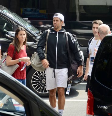 Fernando Verdasco, middle, and his wife Ana Boyer, show up at a hotel before 2019 ATP in Shanghai, China, 4 October 2019.  clipart