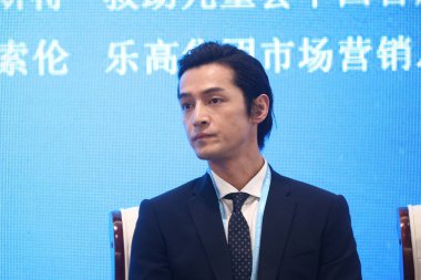 Chinese actor and singer Hu Ge, also known as Hugh Hu, delivers a speech to advice juveniles to adore stars rationally at a forum related to juvenile protection and environmental governance at the 6th World Internet Conference Wuzhen Summit held in W clipart