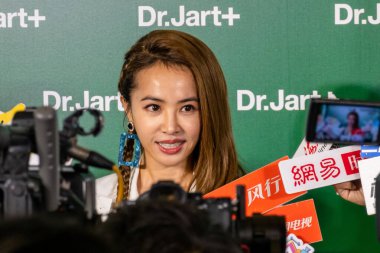 Taiwanese singer, songwriter, dancer, actress, and businesswoman Jolin Tsai shows up at Raffles shopping mall in Shanghai, China, 11 October 2019. clipart