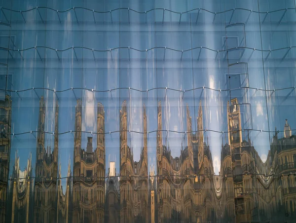 background reflection of Romanesque, Gothic architecture  in modern glass facade, avant-garde architecture in modern times