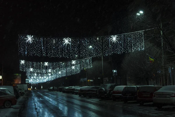 Glowing lights on the road street at night time