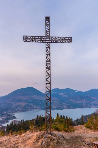 cross on the hill in the mountains