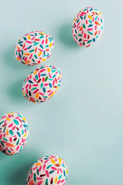 Funny multicolored easter eggs hand painted with brushes, on sof — Stock Photo, Image