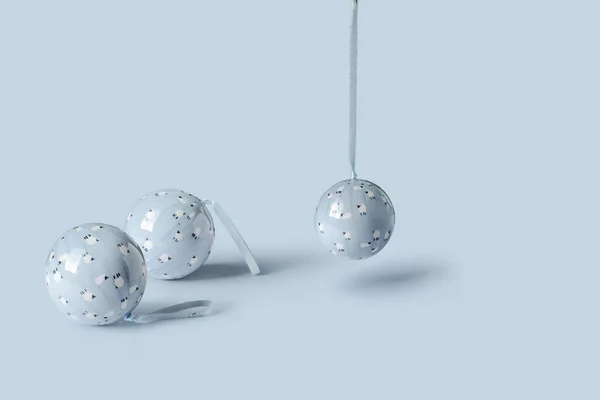 Pastel Christmas decoration balls on soft blue background. Minim — Stock Photo, Image