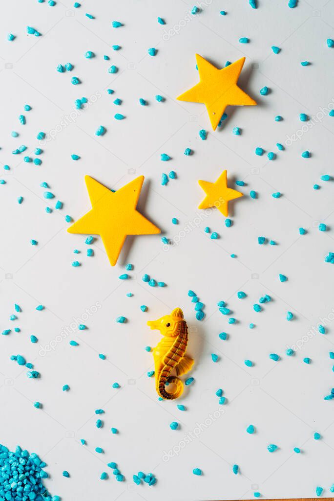 seahorse and yellow stars, summer time minimal concept