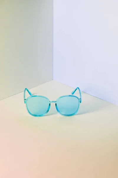 Modern Blue Sunglasses Front Corner Pastel Wall Background Copy Space — Stock Photo, Image