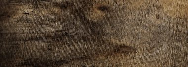 Tahta pankart. Ahşap dokular. Soyut zemin. Metni kopyalamak için boşluk. Tamamlanmamış pürüzlü tahta yüzey.