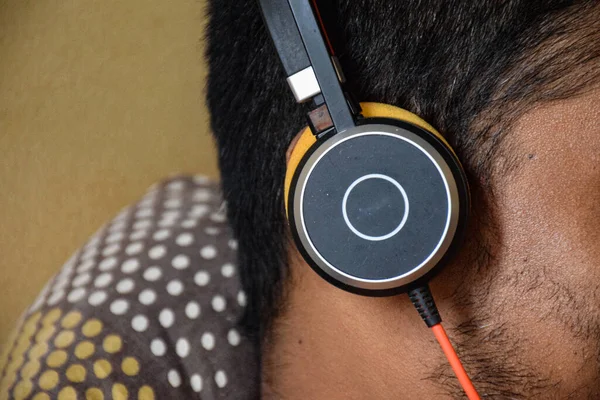 Boy wearing headphone and listening music