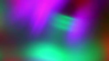 Soyut renk arkaplanı. Bulanık hareket eden renkli LED ışıkların, pürüzsüz video döngüsünün yakın plan görüntüsü.