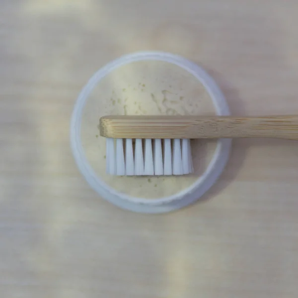 Bamboo Toothbrush Lies White Towel Light Wooden Background Natural Light — Stock Photo, Image