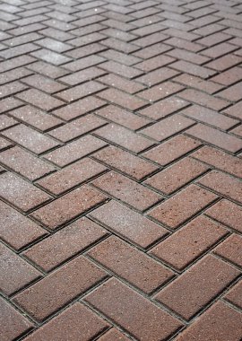 Modern kahverengi taş yol kaldırım arka plan. Granit kaldırım. Kahverengi kaldırım taşı kaldırım doku. Alay kadar veya vintage grunge şablon.