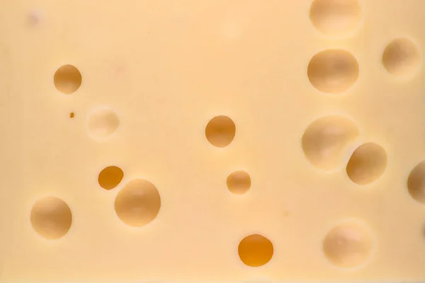 Cerca Textura Del Queso Amarillo Queso Con Grandes Agujeros Fondo — Foto de Stock