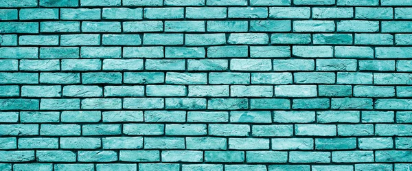 Bright blue Brick wall texture close up.
