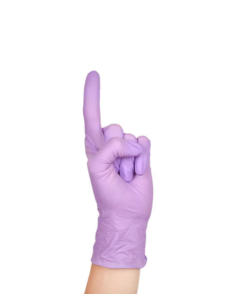 Kéz a lila latex kesztyű izolált fehér. Női kézmozdulat vagy jel elszigetelt fehér. — Stock Fotó