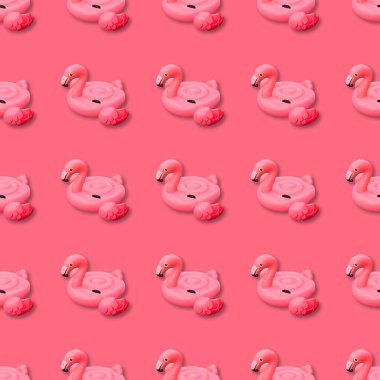 Swimming pool toy in shape of pink flamingo seamless pattern. Flamingo inflatable cut out clipart