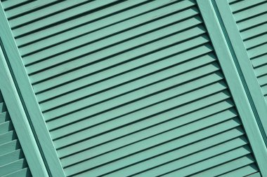 Çapraz kalaslarla ahşap kaplama arka plan. Düğümlü eski nane ahşap arkaplan dokusu