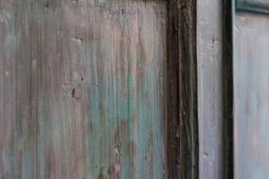 Eski püskü eski turkuaz panoları. Eski kapı. Doku.