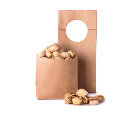 fıstık fındık ve Kuruyemiş zanaat paket içinde. Fotoğraf kataloğu için. Logo, sizin metin için yer. bir paket içinde fıstık.