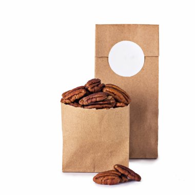 Pekan cevizli zanaat paket içinde. Fındık ve kuru meyve zanaat paket içinde. Fotoğraf kataloğu için. Logo, sizin metin için yer.