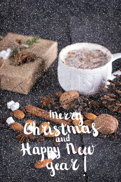 Cocoa, coffee  with marshmallows, nuts, gift. Winter, New Year, Christmas still life.