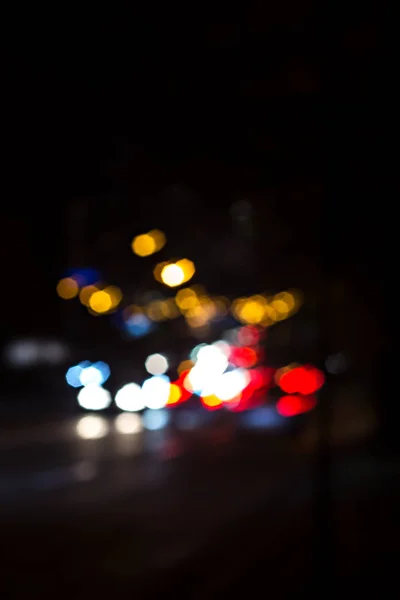 lights of the night city. unfocused photo. Blurred lights background .