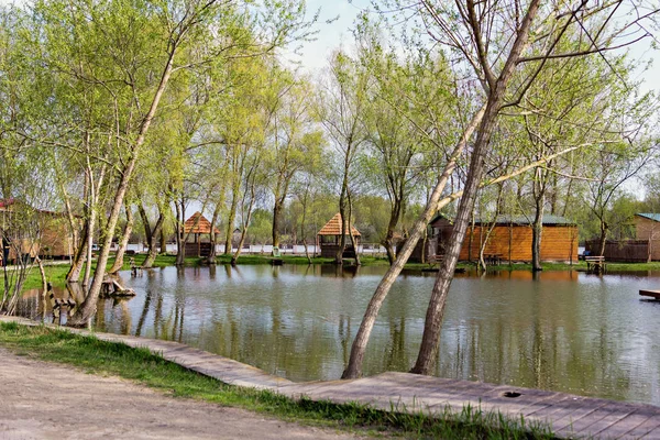 Houses on the river bank. Rest house, hotel on the river bank.