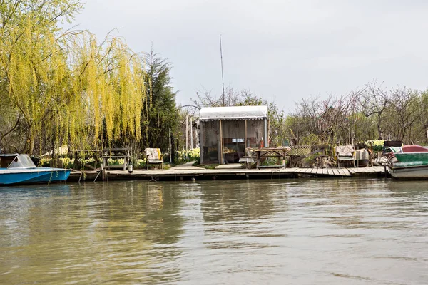 Houses on the river bank. Rest house, hotel on the river bank.