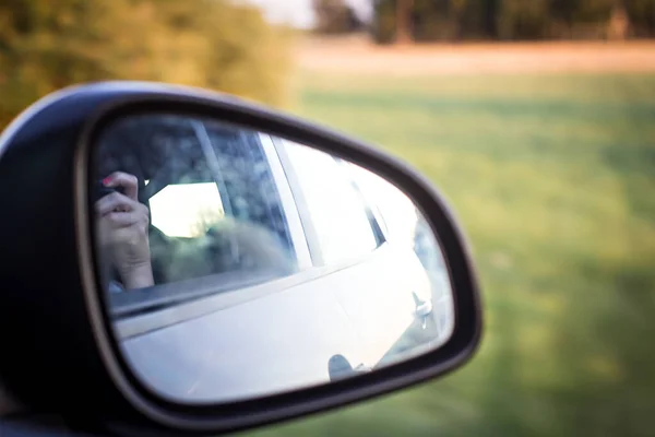 Side mirror in the car.