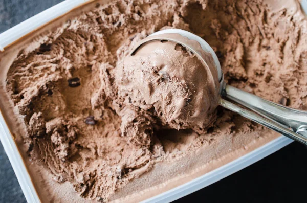 Scoop with delicious chocolate ice cream ball — Stock Photo, Image
