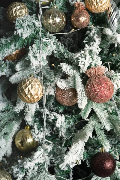 Decorated Christmas tree with balls, snowflakes and cones. — Stock Photo, Image