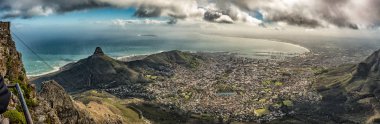 CAPE TOWN, SOUTH AFRICA, AUGUST 17, 2018: Panorama of Lions Head, Signal Hill, Robben Island and part of Cape Town as seen from the top of Table mountain clipart