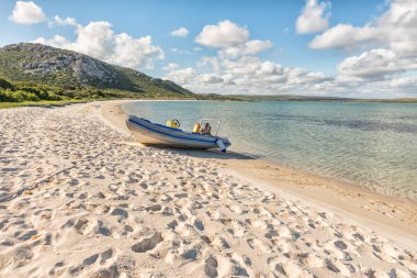 WEST COAST NATIONAL PARK, SOUTH AFRICA, AUGUST 20, 2018: A speedboat at a beach in Kraalbaai in the Langebaan Lagoon on the Atlantic Ocean coast in the Western Cape Province clipart