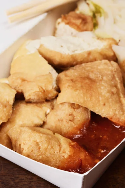 Stinky tofu in takeout food box