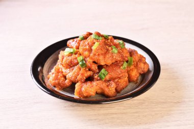 Kore usulü soslu kızarmış tavuk.   