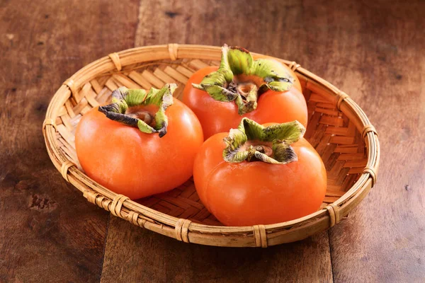 Delicious Ripe Persimmon Fruit Bamboo Basket — Stock Photo, Image