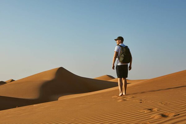 Young tourist in desert