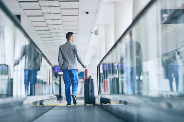 Well dressed man travel by airplane — Stock Photo, Image