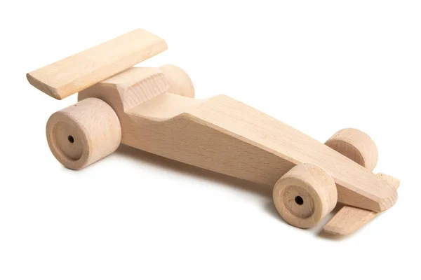 Ručně vyráběné dřevěné hračky na bílém podkladu. Závodní automobil — Stock fotografie