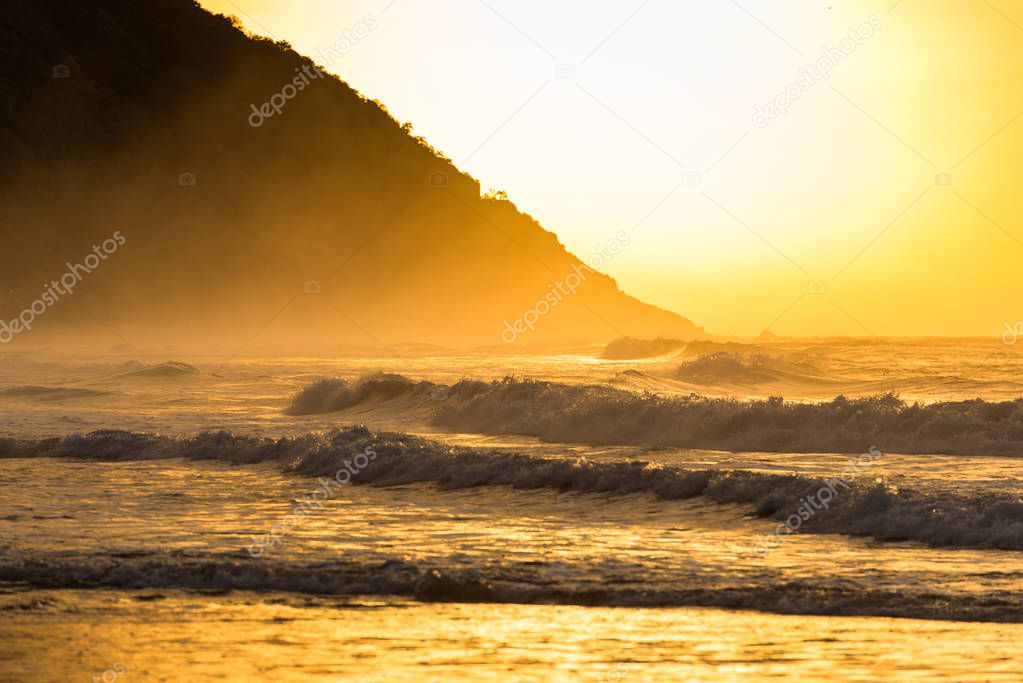 Sunrise on the Beach With Mountain Coast