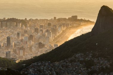 View of Favela Rocinha at sunrise with Ipanema district in Rio de Janeiro, Brazil clipart