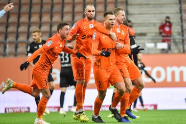 Lubin, Polonya - 22 Aralık 2018: Lehçe Loto Ekstraklasa maç maç Kghm Zaglebie Lubin - Cracovia 1:2 arasında. Bartosz Kopacz (2) ve oyuncu gol gol sonra Zaglebie sevinç.