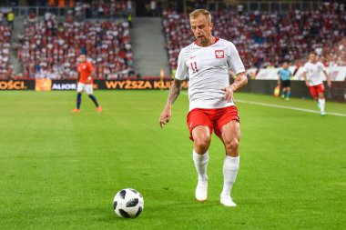 Poznan, Polonya - 8 Haziran 2018: Uluslararası futbol dostluk maçı: Polonya vs Şili 2:2. Eylem Kamil Grosicki.