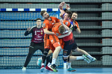Lubin, Polonya-13 Mart, 2019: Polonya PGNiG Superleague erkekler arasında hentbol maç MKS Zaglebie Lubin-Energa Wybrzeze Gdansk 29:25. Eylem Roma Chychykalo (71) ve dövüş oyuncuları