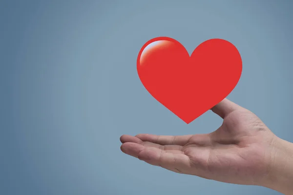 Health Care Insurance Concept Heart Hand Blue Background — Stock Photo, Image