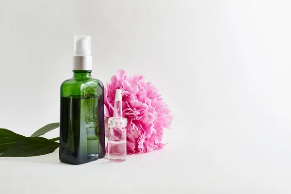 Aromatic body oils, flowers. place for text.