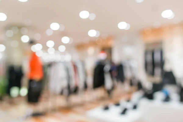 Wazig vitrines mode boetiek kleding winkel in een modern winkelcentrum. Doek en acessorie moderne winkel Blur achtergrond. — Stockfoto