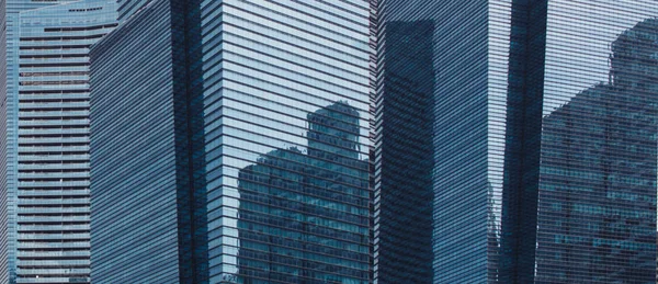 Downtown Business District blå glas skyskrapor bakgrund mönster — Stockfoto
