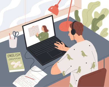 Öğrenci bilgisayar ekranından dersini izleyerek internetten öğreniyor..